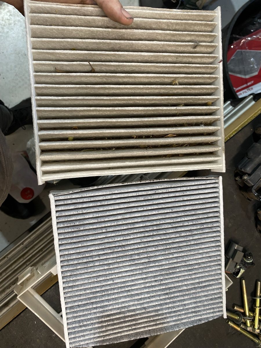 Dirty cabin filter and clean replacement filter from a vehicle service